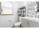 Bright bathroom with functional storage and classic fixtures at 113 Woodland Dr., Murrells Inlet, SC 29576