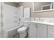 Bright bathroom with a tub and shower combination, white vanity, and neutral decor at 113 Woodland Dr., Murrells Inlet, SC 29576