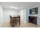 Cozy dining area with wooden table, chairs, and a charming ambiance, ideal for Gathering meals and gatherings at 113 Woodland Dr., Murrells Inlet, SC 29576
