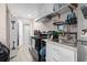 Functional kitchenette equipped with modern appliances and storage solutions at 113 Woodland Dr., Murrells Inlet, SC 29576