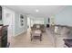 Spacious living room featuring tile floors, comfortable couches, and a cozy atmosphere at 113 Woodland Dr., Murrells Inlet, SC 29576