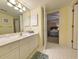 Bathroom with white vanity and a doorway leading to a bedroom at 125 South Dunes Dr., Pawleys Island, SC 29585