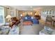Comfortable living room with a plush blue sofa, armchairs, and stylish decor at 125 South Dunes Dr., Pawleys Island, SC 29585
