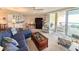 Inviting living room with balcony access and comfortable seating arrangement at 125 South Dunes Dr., Pawleys Island, SC 29585