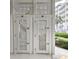 Image shows white, wooden storage lockers with numbered doors outside the building at 125 South Dunes Dr., Pawleys Island, SC 29585