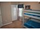 room with bunk beds, natural light, and a comfortable, carpeted floor at 1266 River Oaks Dr. # 12-F, Myrtle Beach, SC 29579