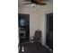 Cozy outdoor patio with ceiling fan and seating, perfect for relaxing and enjoying the breeze at 1266 River Oaks Dr. # 12-F, Myrtle Beach, SC 29579