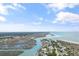 Stunning aerial view of the coast, showcasing pristine beaches and lush greenery near the waters edge at 144 Puffin Dr. # 3C, Pawleys Island, SC 29585