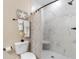 Bathroom with a marble shower, white fixtures, and tasteful nautical decor at 144 Puffin Dr. # 3C, Pawleys Island, SC 29585