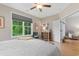 Bedroom featuring a window with a view, leading to the living area at 144 Puffin Dr. # 3C, Pawleys Island, SC 29585