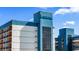 Striking view of the building's unique architecture with 'LANDMARK' signage against a beautiful blue sky at 1501 S Ocean Blvd. # 1231, Myrtle Beach, SC 29577