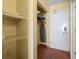 Walk-in closet with shelving and hanging storage, and an iron/ironing board at 1501 S Ocean Blvd. # 1231, Myrtle Beach, SC 29577