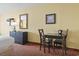 Suite with a table, chairs, dresser, and TV at 1501 S Ocean Blvd. # 1231, Myrtle Beach, SC 29577