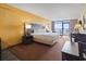 Comfortable main bedroom featuring a king-size bed, sitting area, and a balcony with beautiful ocean views at 1501 S Ocean Blvd. # 1231, Myrtle Beach, SC 29577