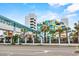 Outdoor water park featuring palm trees and play areas, perfect for Gathering fun and relaxation at 1501 S Ocean Blvd. # 1231, Myrtle Beach, SC 29577