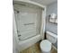 Well-lit bathroom with a tub-shower combination, neutral tile, and ample space at 1905 S Ocean Blvd. # 922-924, Myrtle Beach, SC 29577