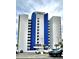 Exterior elevation of the Ocean Park Resort Building with a blue and white facade at 1905 S Ocean Blvd. # 922-924, Myrtle Beach, SC 29577