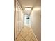 Hallway with neutral tile and storage closet at 1905 S Ocean Blvd. # 922-924, Myrtle Beach, SC 29577
