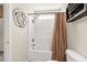 Cozy bathroom showcasing a shower, toilet, and wall art at 193 Charter Dr. # E7, Longs, SC 29568
