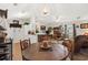 Open dining area with bar seating, and an open view to the kitchen and living room at 193 Charter Dr. # E7, Longs, SC 29568