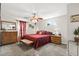 Inviting main bedroom with a ceiling fan, natural light, and ample furniture space at 193 Charter Dr. # E7, Longs, SC 29568