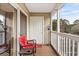 Small patio with an open view of the building's exterior and parking area at 193 Charter Dr. # E7, Longs, SC 29568