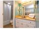 Bathroom with white cabinets, mosaic tile, shower and toilet at 2001 S Ocean Blvd. # 914, Myrtle Beach, SC 29577