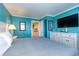 Comfortable main bedroom with calming turquoise walls, white furnishings, and tile floors at 2001 S Ocean Blvd. # 914, Myrtle Beach, SC 29577
