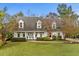 Charming home with a well-manicured lawn, mature landscaping, and a welcoming facade at 2170 Deerfield Ave., Surfside Beach, SC 29575