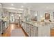 Kitchen island featuring a granite countertop and an adjacent dining area with bright natural light at 2170 Deerfield Ave., Surfside Beach, SC 29575