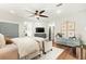 Spacious main bedroom with hardwood floors and a comfortable sitting area at 2170 Deerfield Ave., Surfside Beach, SC 29575
