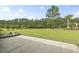 The backyard has a hammock and overlooks a pond surrounded by trees at 2204 Woodstork Dr., Conway, SC 29526