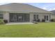 This backyard features a screened in porch and ample space to run around at 2204 Woodstork Dr., Conway, SC 29526
