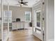 Bright office space with hardwood floors, ceiling fan, neutral paint, and double doors leading to the outdoors at 2204 Woodstork Dr., Conway, SC 29526