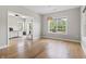 Spacious office with a large window, hardwood floors, and an adjacent room at 2204 Woodstork Dr., Conway, SC 29526