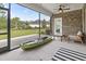 The screened porch overlooks the landscaped backyard at 2204 Woodstork Dr., Conway, SC 29526