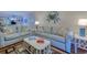 Relaxing living room with comfortable seating, coastal decor, and a bright, inviting atmosphere at 223 Maisons Dr. # C8, Myrtle Beach, SC 29572