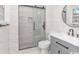 Bathroom featuring a glass-enclosed shower, modern sink, and elegant tile work at 23 Gabe Pl., Pawleys Island, SC 29585