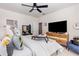 Comfortable bedroom featuring a ceiling fan, dresser, and chic decor accents at 252 Legends Village Loop, Myrtle Beach, SC 29579