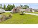 Charming single-story home with well-manicured lawn and inviting curb appeal at 252 Legends Village Loop, Myrtle Beach, SC 29579