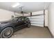 Spacious garage featuring an automatic door and parking for a luxury vehicle at 252 Legends Village Loop, Myrtle Beach, SC 29579