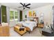 Bright bedroom with a large bed, a window view, and tasteful furnishings at 252 Legends Village Loop, Myrtle Beach, SC 29579