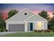 Charming single-Gathering home featuring a gray exterior, complemented by a well-manicured lawn and landscape at 267 River Edge Dr., Myrtle Beach, SC 29588