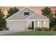 Charming single-Gathering home with a well-manicured lawn, attached garage, and inviting front porch at 283 River Edge Dr., Myrtle Beach, SC 29588