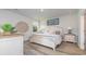 Cozy bedroom featuring a decorative headboard, soft bedding, and a view to the outside at 2879 Riverboat Way, Conway, SC 29526
