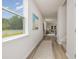 Inviting hallway with natural light, flowing into the open-concept living space at 2879 Riverboat Way, Conway, SC 29526