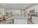 Bright kitchen featuring granite countertops, stainless steel appliances, and a spacious island at 2879 Riverboat Way, Conway, SC 29526