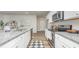 Modern kitchen with stainless steel appliances, granite countertops, and ample cabinet space at 2879 Riverboat Way, Conway, SC 29526