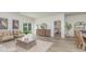 Inviting living room featuring comfortable seating, stylish decor, and an open doorway to a bedroom at 2879 Riverboat Way, Conway, SC 29526