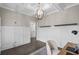 Bright office featuring wainscoting and hardwood floors, providing an elegant and functional workspace at 2909 Moss Bridge Ln., Myrtle Beach, SC 29579